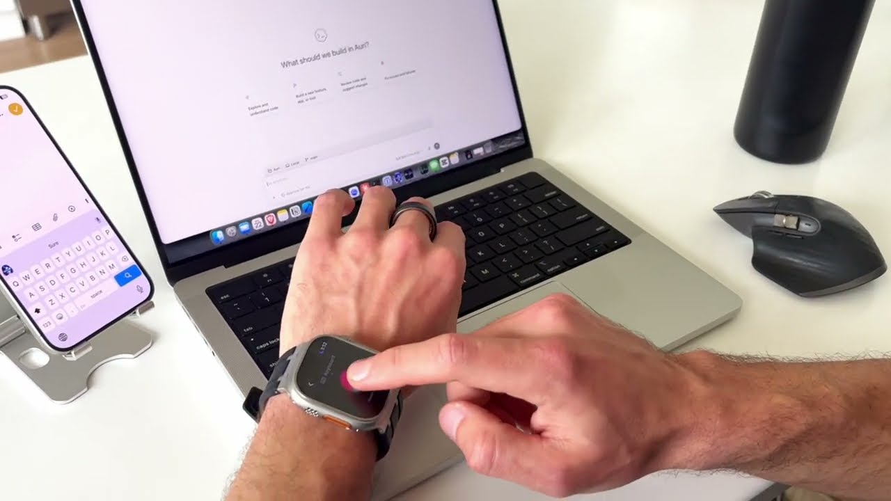 Auri dictation running from an Apple Watch beside an iPhone and Mac